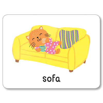 A flashcard from Miles Kelly's Lots to Spot Flashcards At Home! set. The flashcard is white features an illustration of a cat on a sofa with the word "sofa".