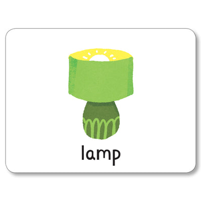 A flashcard from Miles Kelly's Lots to Spot Flashcards At Home! set. The flashcard is white and features an illustration of a lamp alongside the word "lamp".