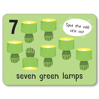 A flashcard from Miles Kelly's Lots to Spot Flashcards At Home! set. The flashcard is green and features the number "7" and illustrations of "seven green lamps".